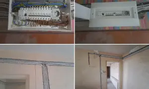Nowy rozdzielacz i przewody elektryczne w bloku. Trwa wymiana instalacji elektrycznej, widać nowe zabezpieczenia i uporządkowane okablowanie.